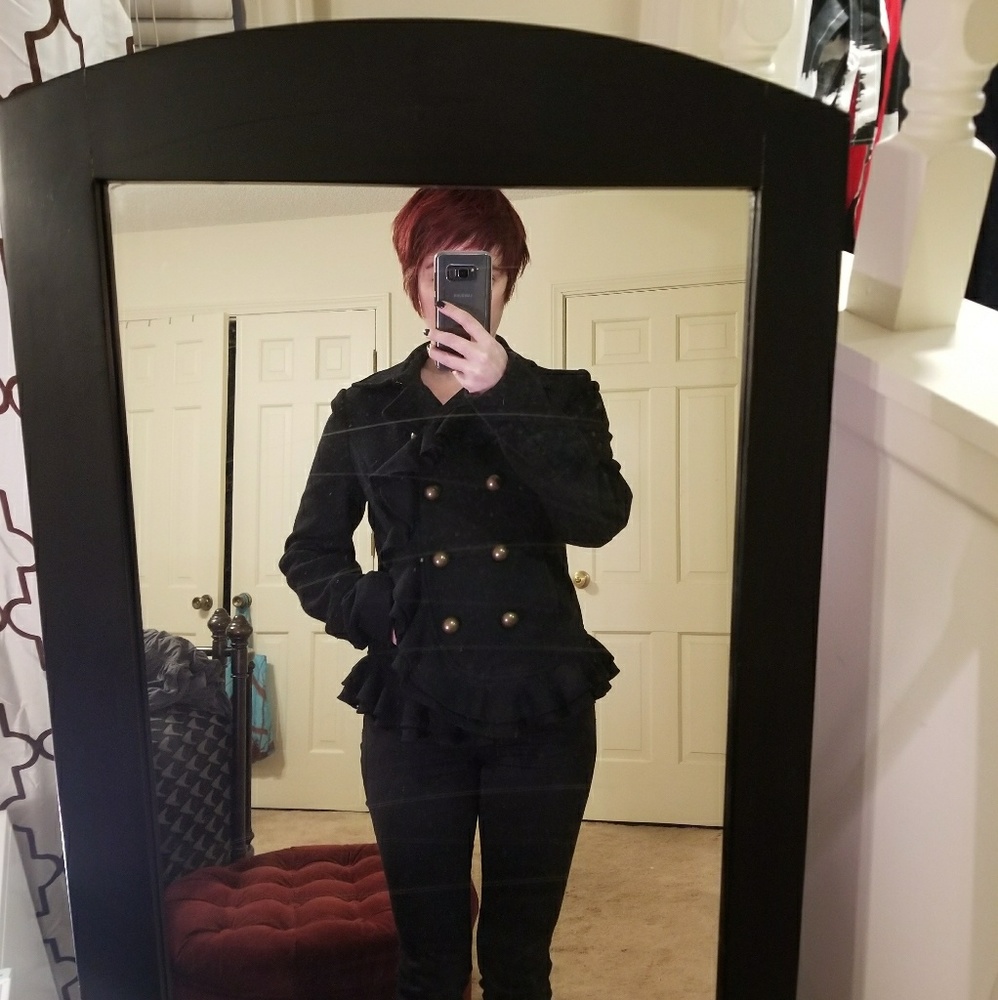 Black wool jacket with ruffle detail